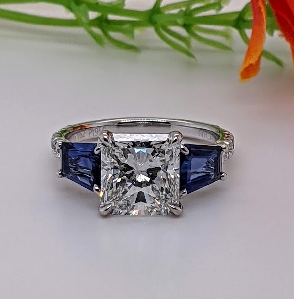 Large Princess Cut Diamond with Blue sapphire tapered baguettes