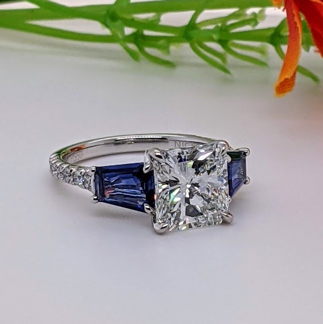 Large Princess Cut Diamond with Blue sapphire tapered baguettes